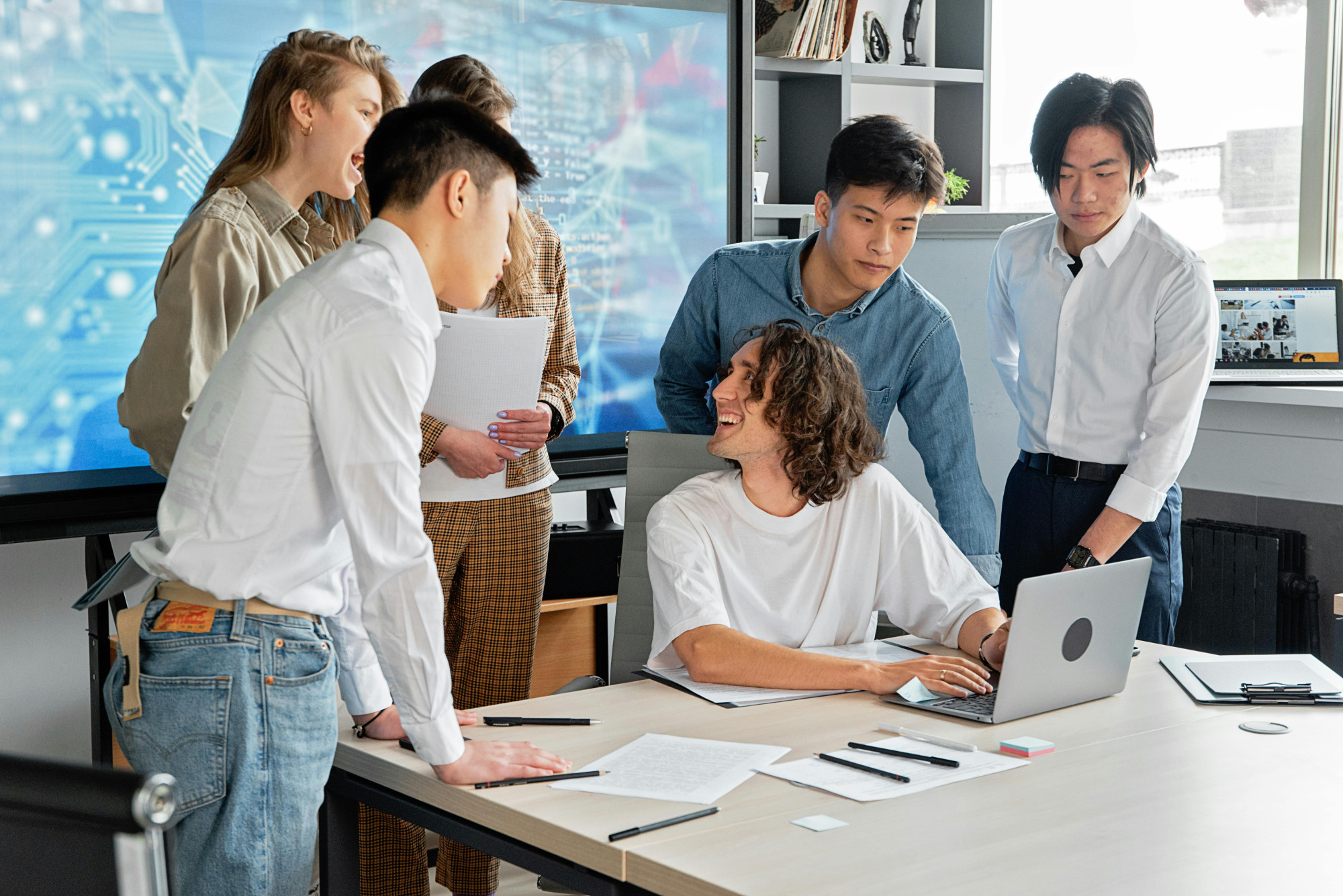 Teams collaborating on creating AI processes. 